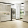 Modern Kitchen Staged with European Style Lacquer White Cabinets with Soft Warm Natural Light